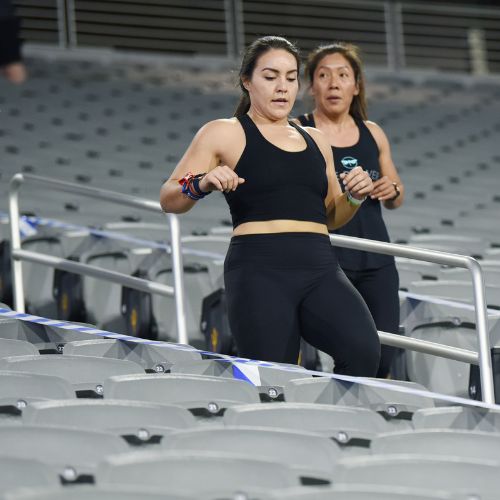 Women running the stairs at Mountain America Stadium
