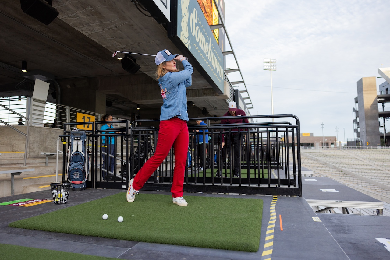 Hit golfballs inside Mountain America Stadium at Sparky's Fairway, 2024