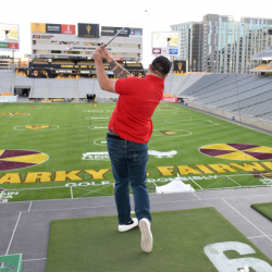 Man in a red shirt swinging at bay 6