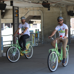 Biking participants lead the walk on the concourse