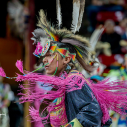 Pow Wow performer in pink. Photo by Tim H. Murphy.