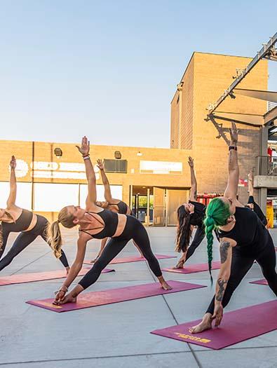 Stadium Yoga - Spring 2022 Series, instructors lead yoga on the sun deck